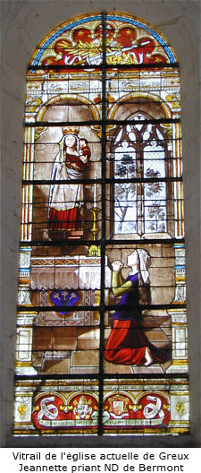 Vitrail de l'église de Greux représentant Jeanne priant ND de Bermont